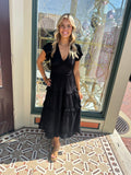 BLACK RUFFLED TEA LENGTH DRESS